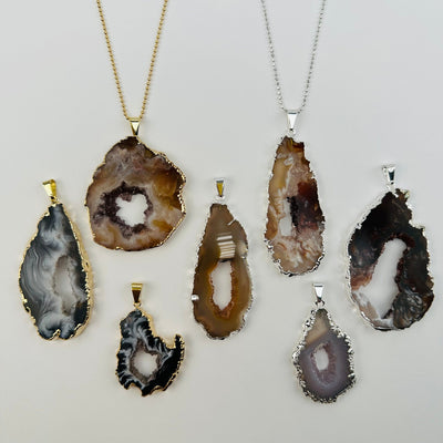 pendants displayed on necklace to show how they hang 