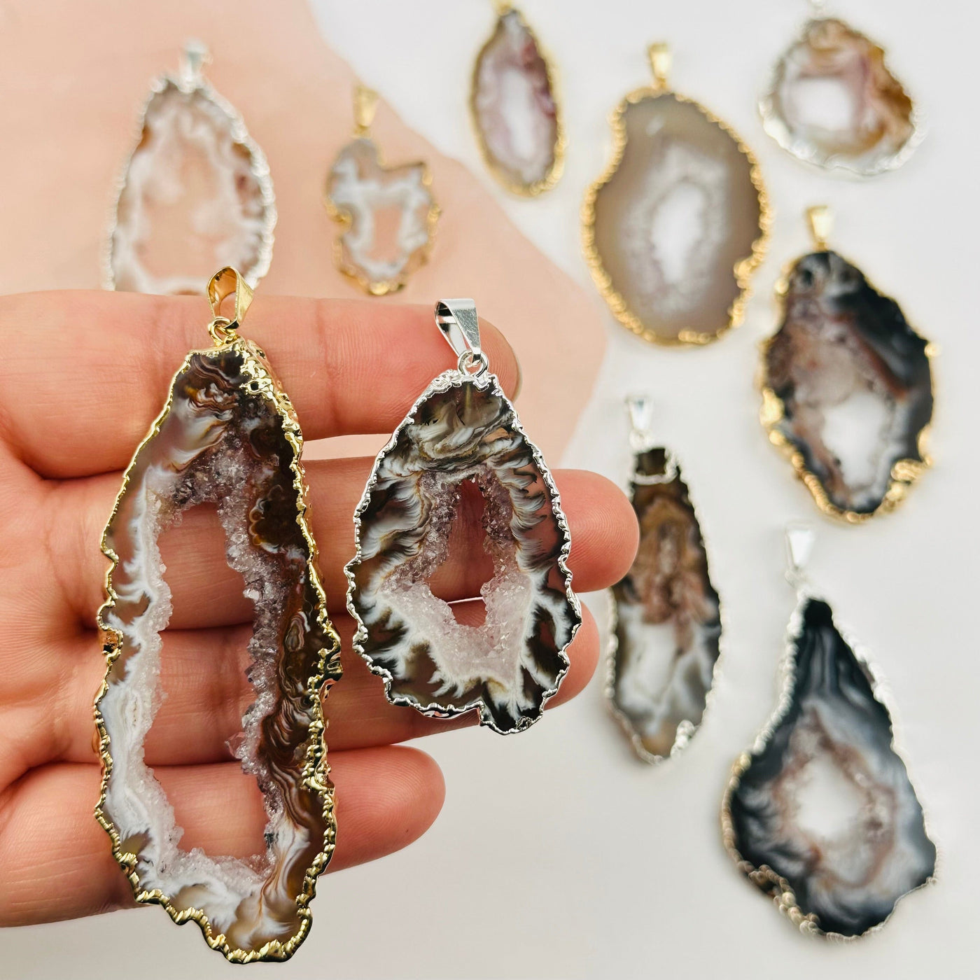 Agate Druzy Slice Pendant in hand for size reference 