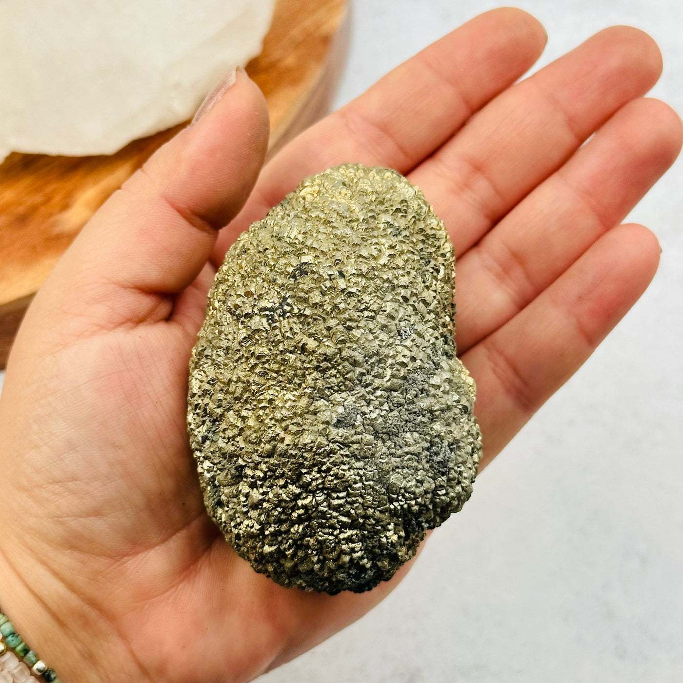 Pyrite Nodule - High Quality in hand for size reference