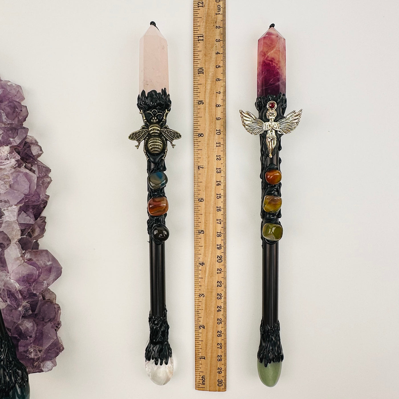 wands next to a ruler for size reference 