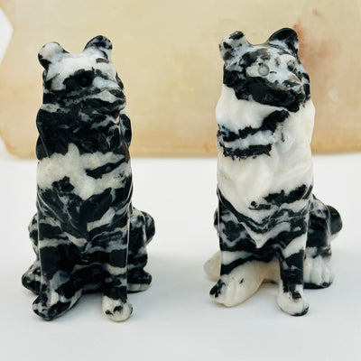 close up of the details on these carved crystal dogs