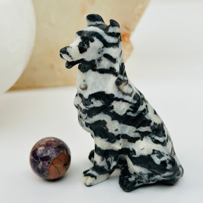 zebra jasper carved crystal dog displayed as home decor