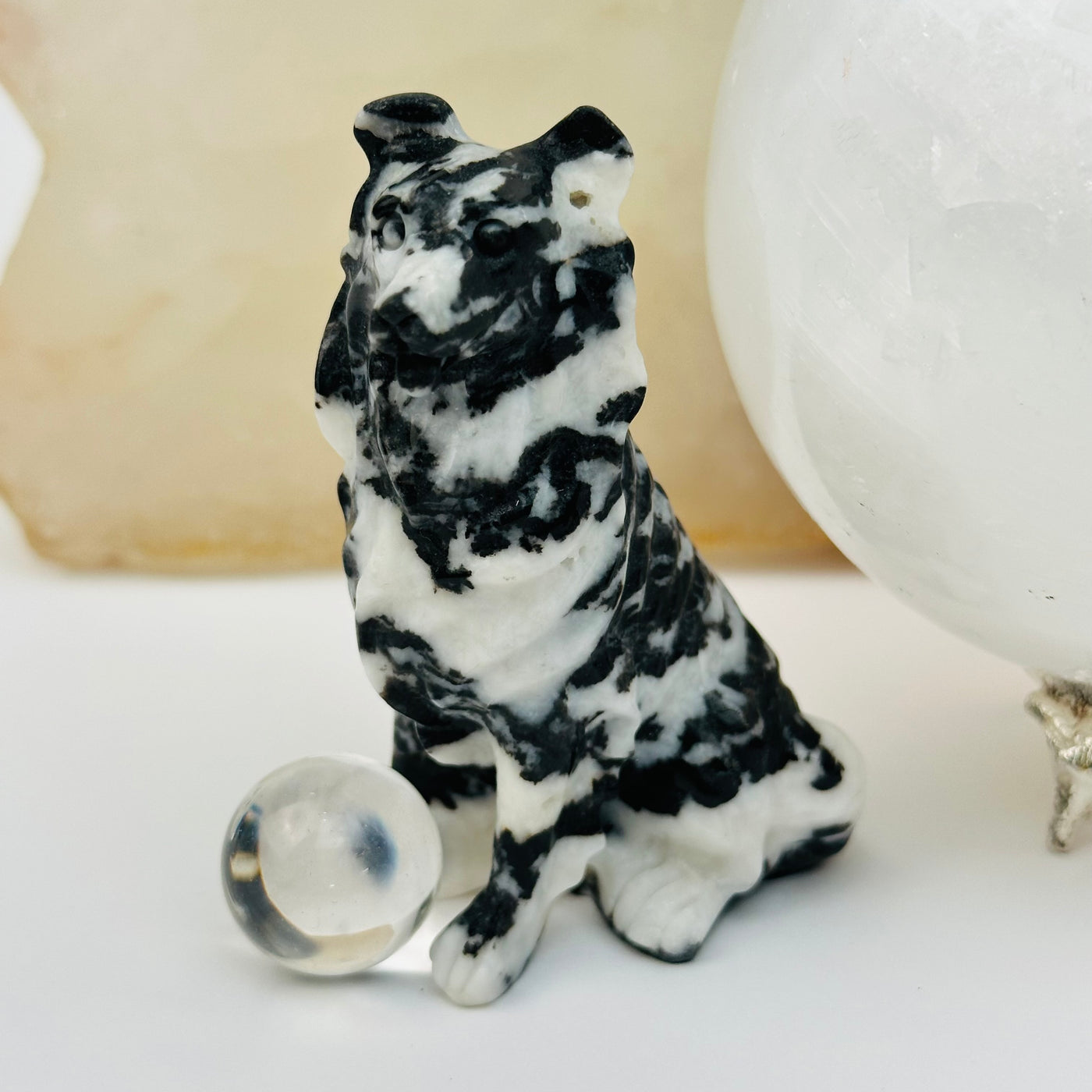 zebra jasper carved crystal dog displayed as home decor