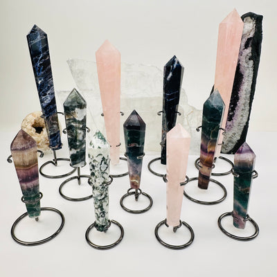 multiple crystal wands displayed to show the differences in the sizes and crystal types