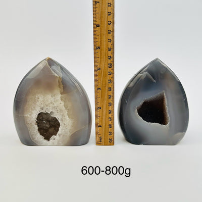 agate points are sold by weight, next to a ruler for size reference 