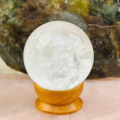 Crystal Quartz Polished Sphere displayed as home decor