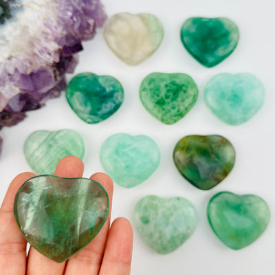 fluorite heart in hand for size reference 