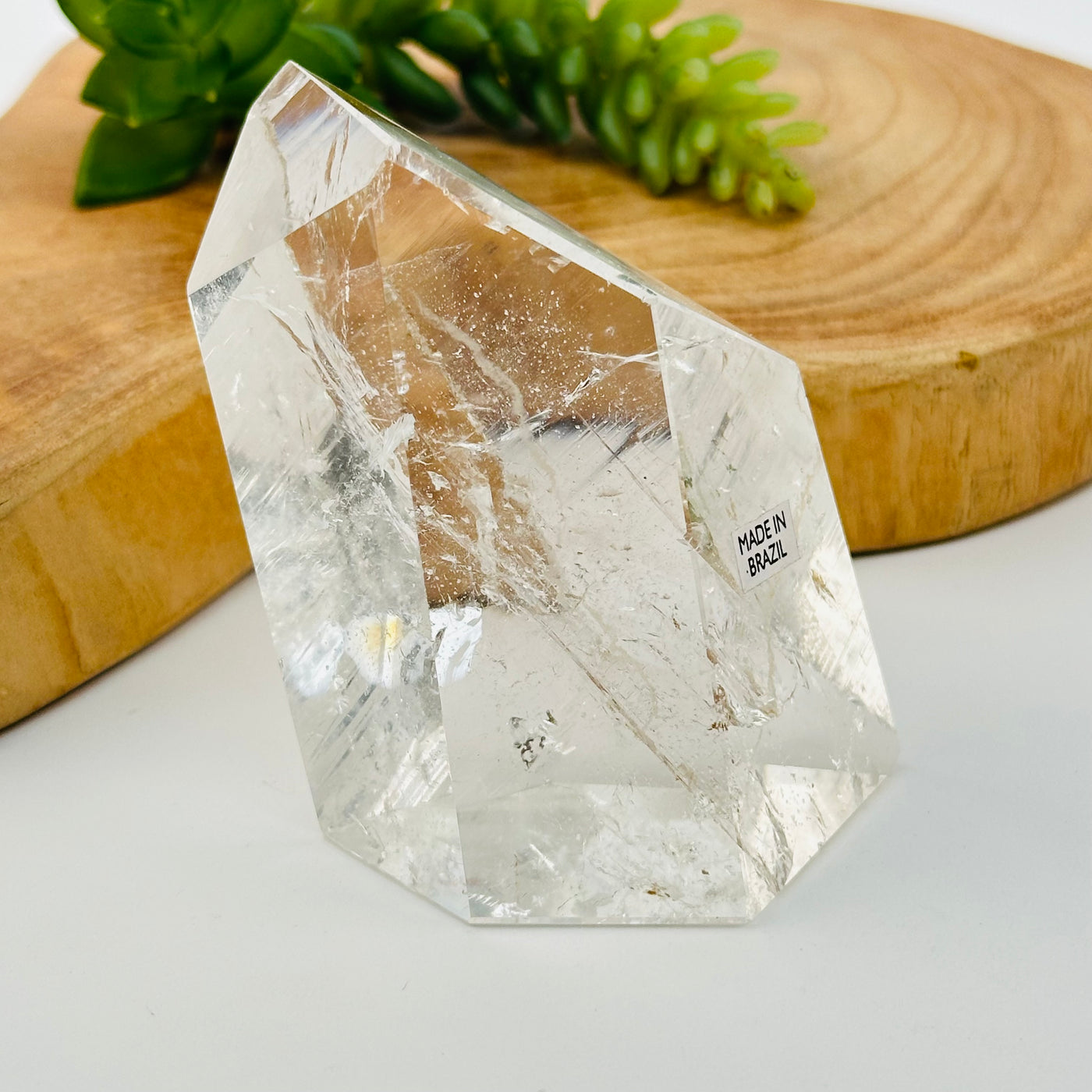 crystal quartz polished freeform crystal displayed as home decor 