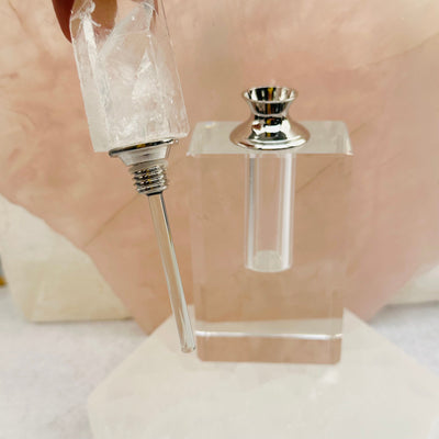 close up of the glass perfume applicator 
