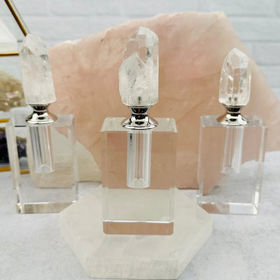 Crystal Quartz Point Top Perfume Bottles displayed to show the differences in the crystal sizes 