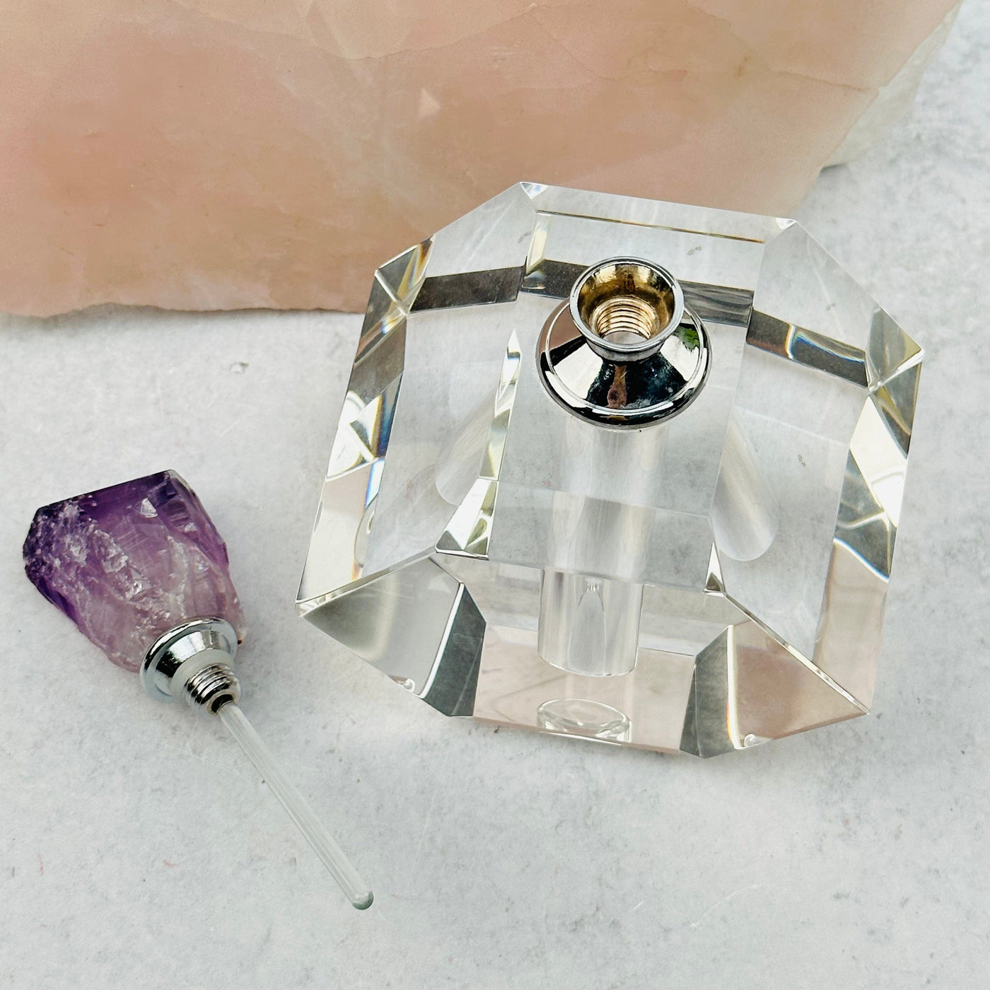 the amethyst top can be unscrewed and filled with your favorite perfume or oil 
