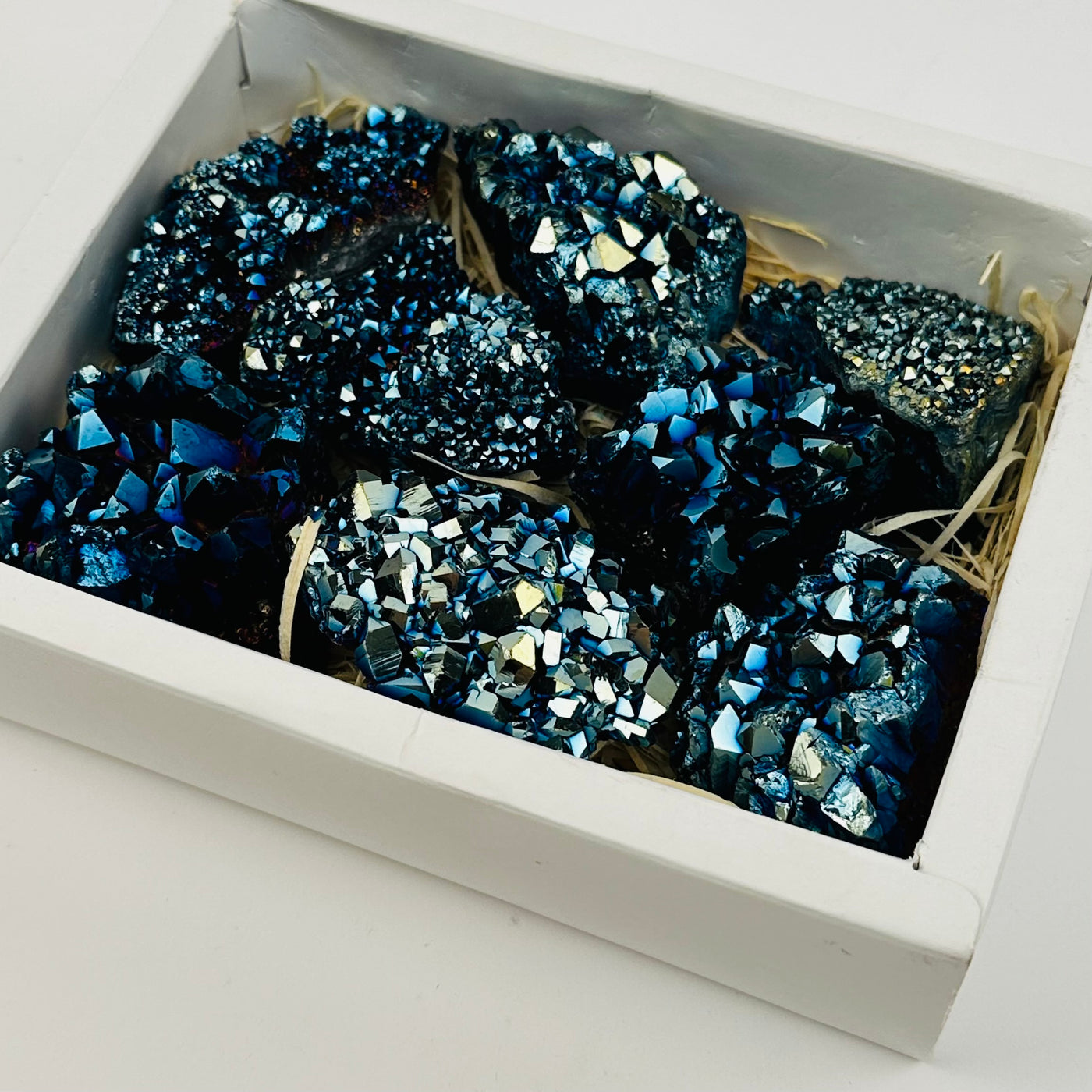 mystic blue titanium coated amethyst crystals in flat box