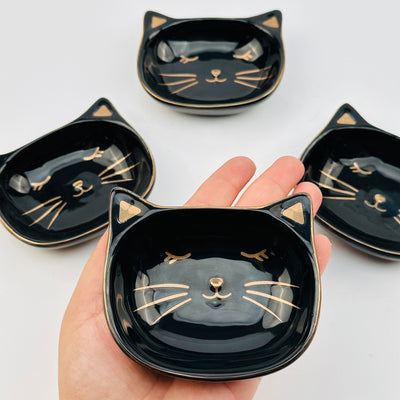 ceramic cat dishes can be used as home decor