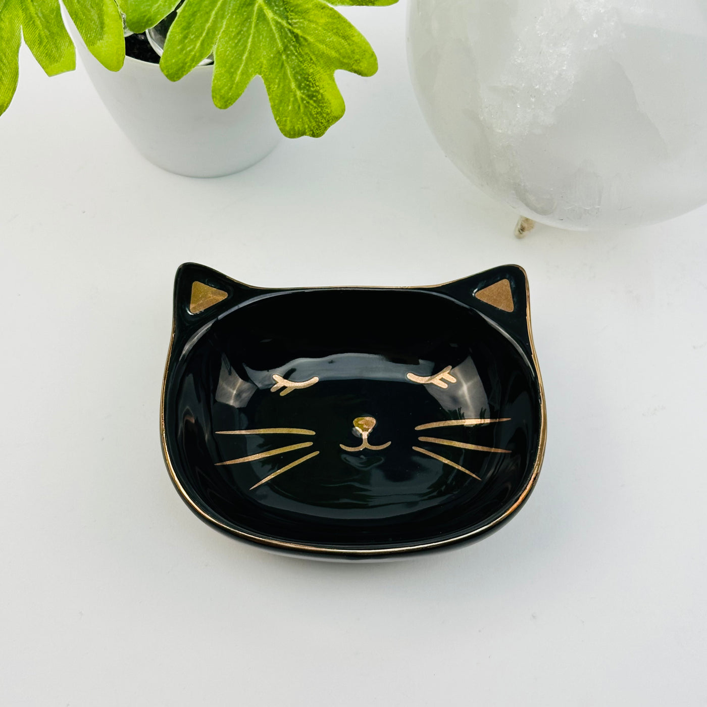 ceramic cat dish displayed as home decor