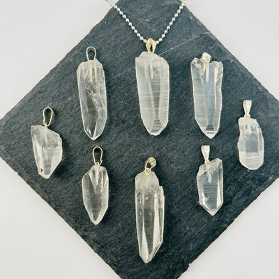 multiple pendants displayed to show the differences in the sizes 