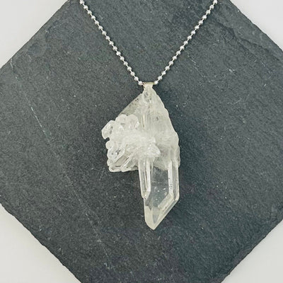 pendant displayed on necklace to show how it hangs 