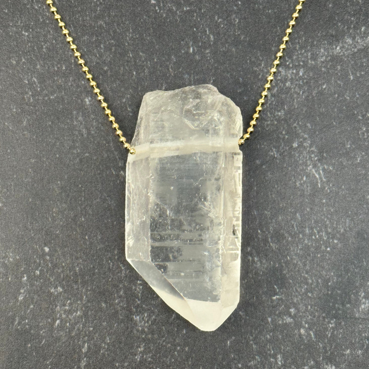 Crystal Quartz Point Rough Jumbo Size displayed on necklace chain 