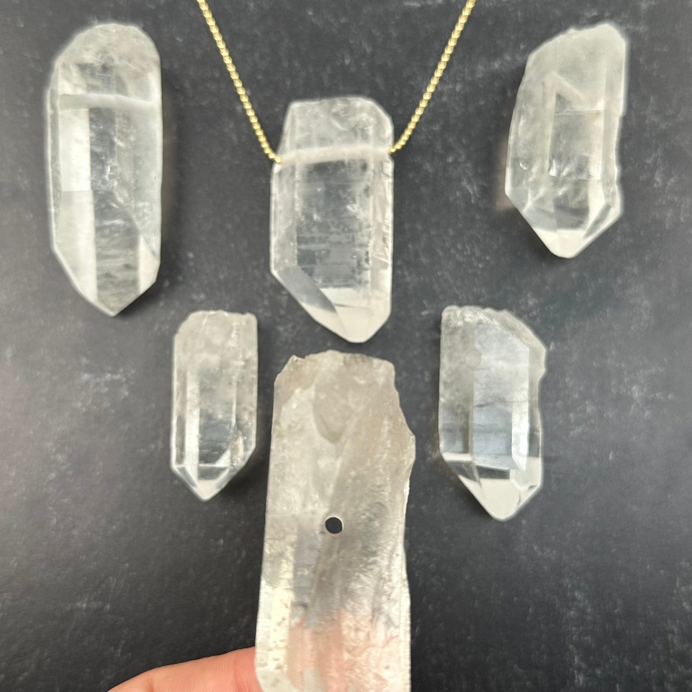 close up of the drill hole on this crystal quartz jumbo pendant 