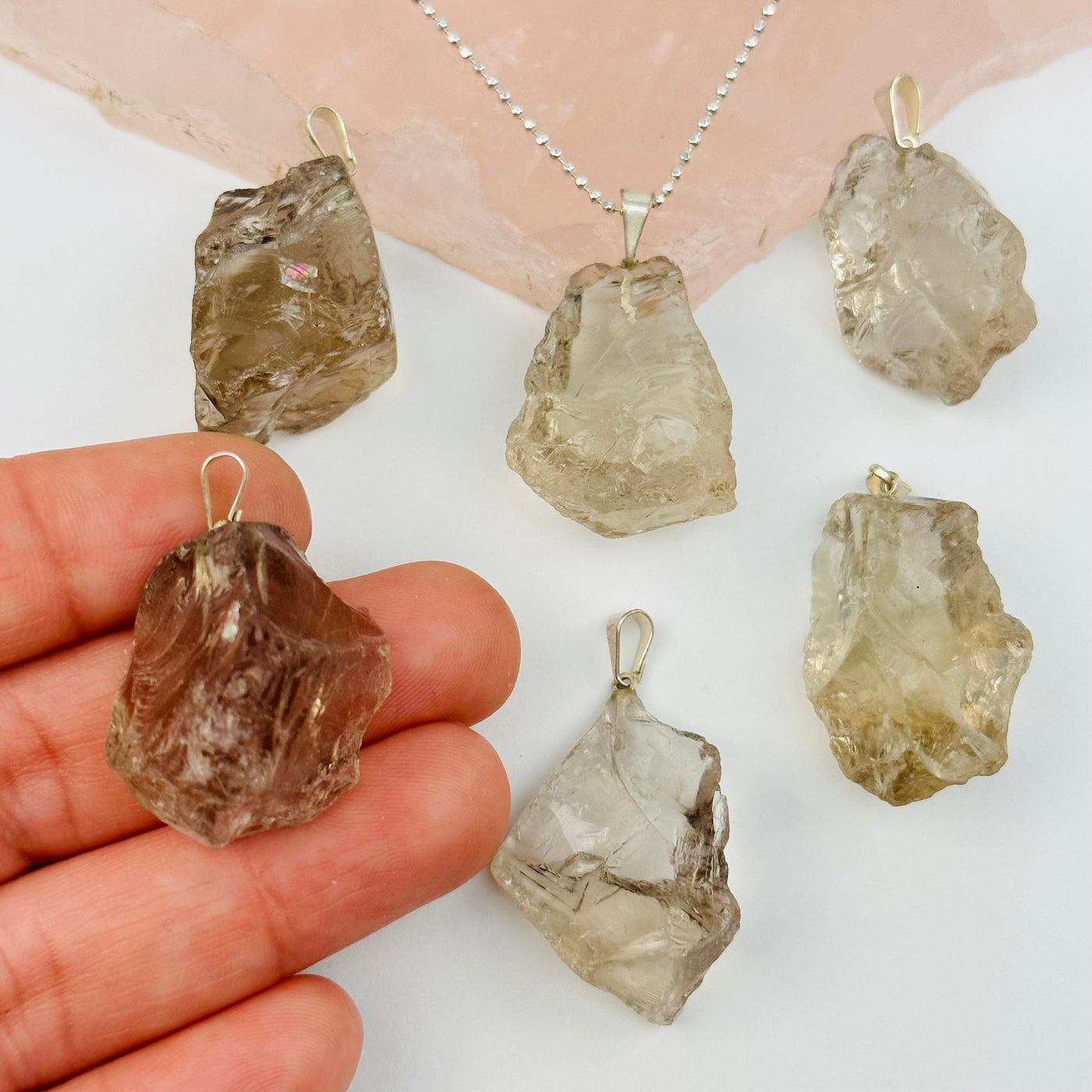 Rough Natural Crystal Stone Pendant - Smokey quartz - in hand for size reference