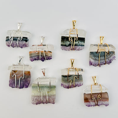 pendants displayed to show the differences in the sizes and color shades 