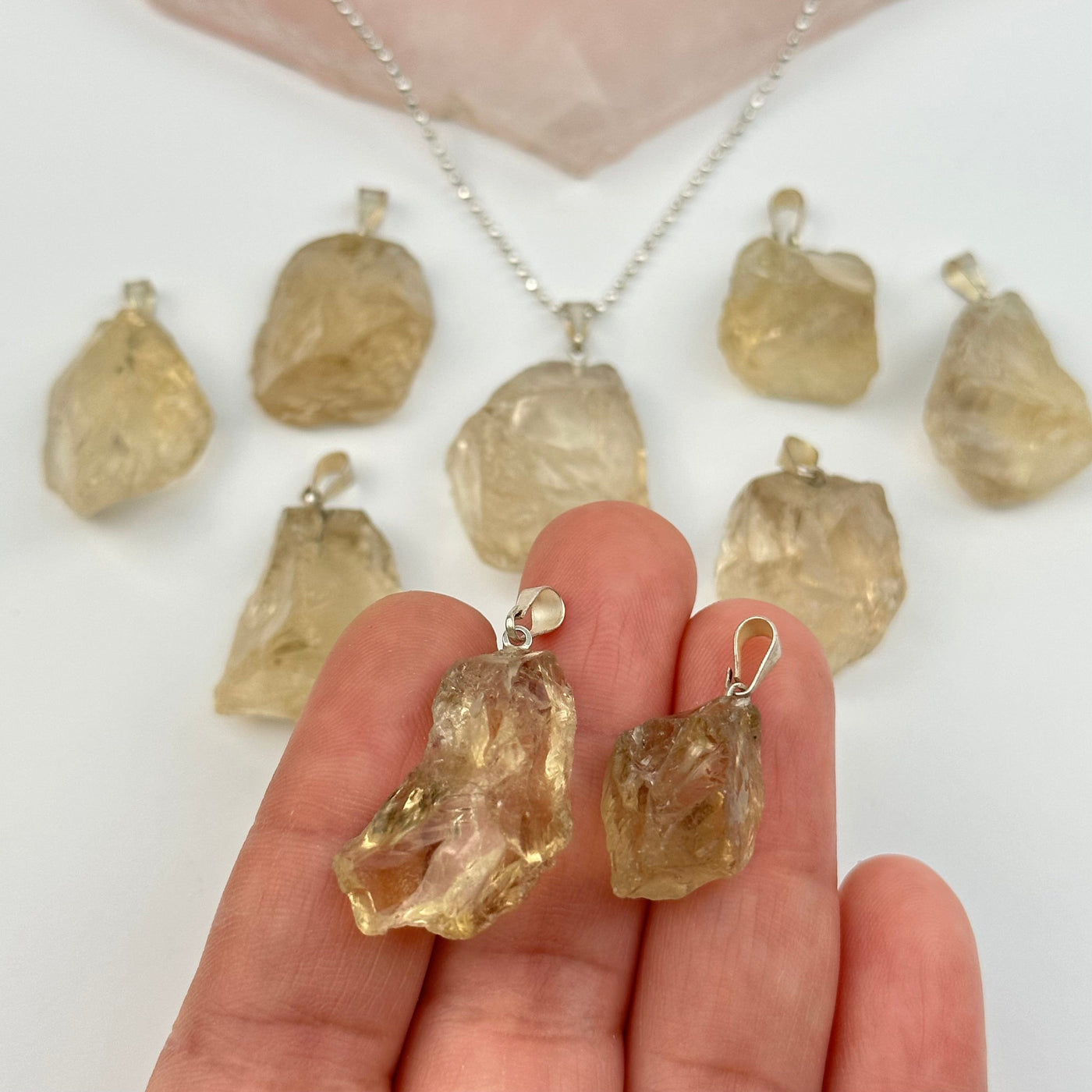 Rough Natural Crystal Stone Pendant - citrine - in hand for size reference
