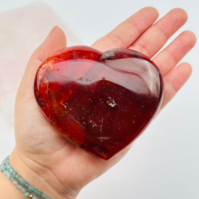 close up of the details on this carnelian heart 