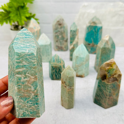 close up of the details on this Amazonite Crystal Polished Tower Obelisk Point