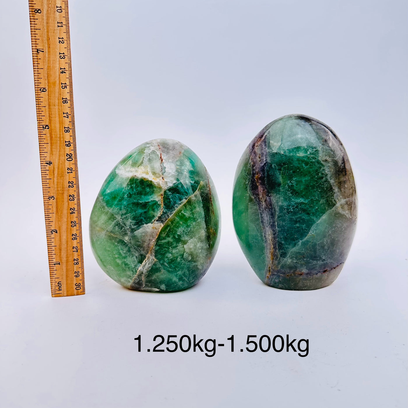 fluorite crystal cut base sold by weight - next to a ruler for size reference 