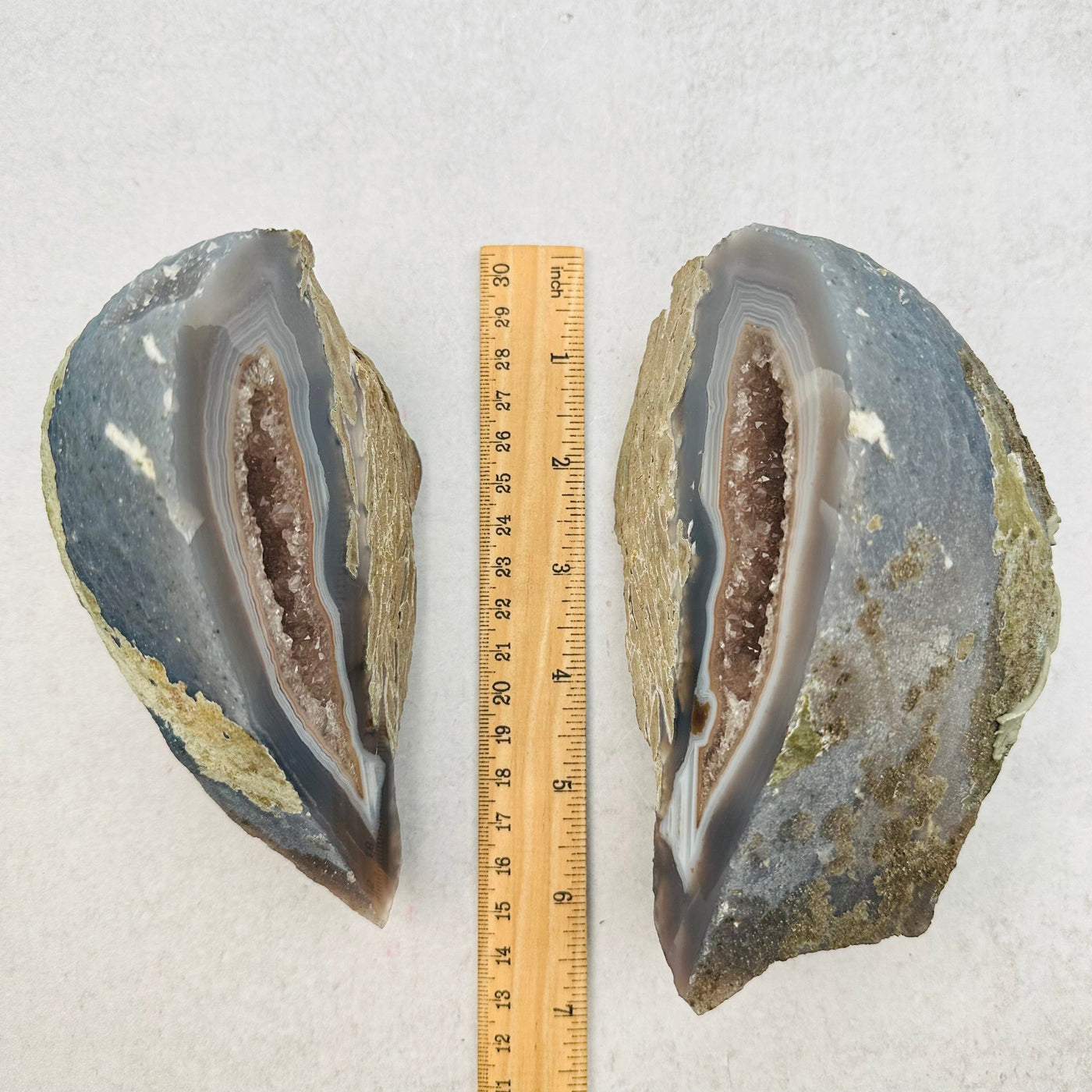 Agate Geode Crystal Pair next to a ruler for size reference 
