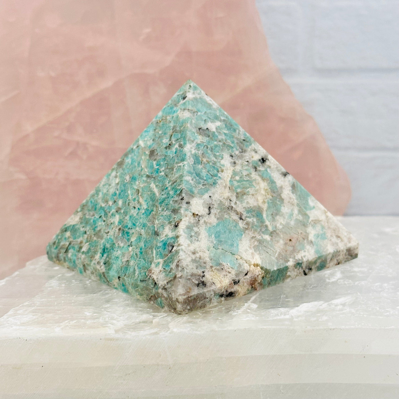 Amazonite Crystal Pyramid displayed as home decor 