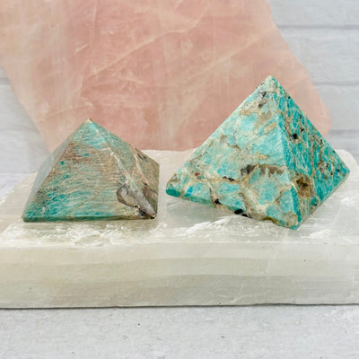 Amazonite Crystal Pyramids displayed as home decor 