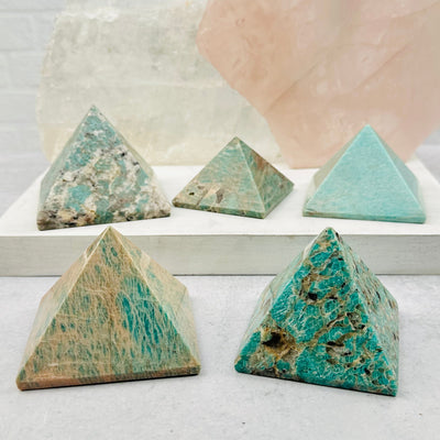 multiple pyramids displayed to show the differences in the color shades and sizes 