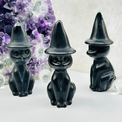 black onyx crystal cats with a hat displayed as home decor