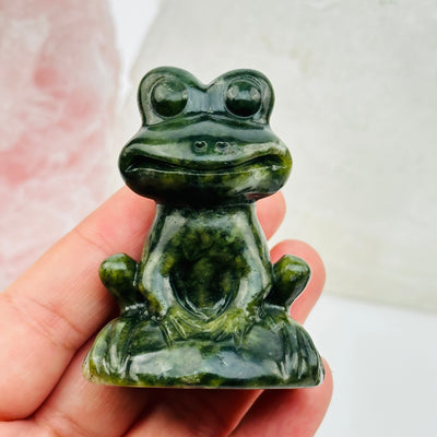 jadeite crystal frog on hand for size reference