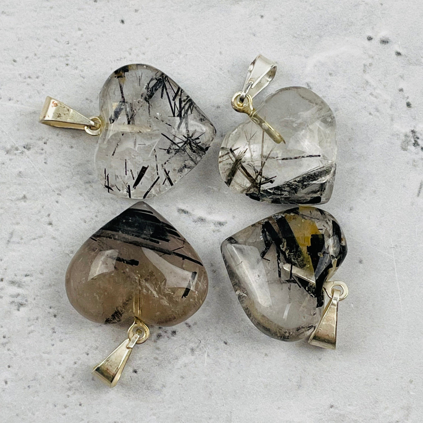 close up of the quartz with black tourmaline hearts 