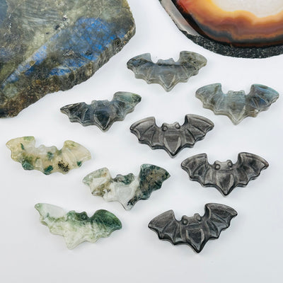 multiple crystal bats displayed to show the differences in the gemstone types