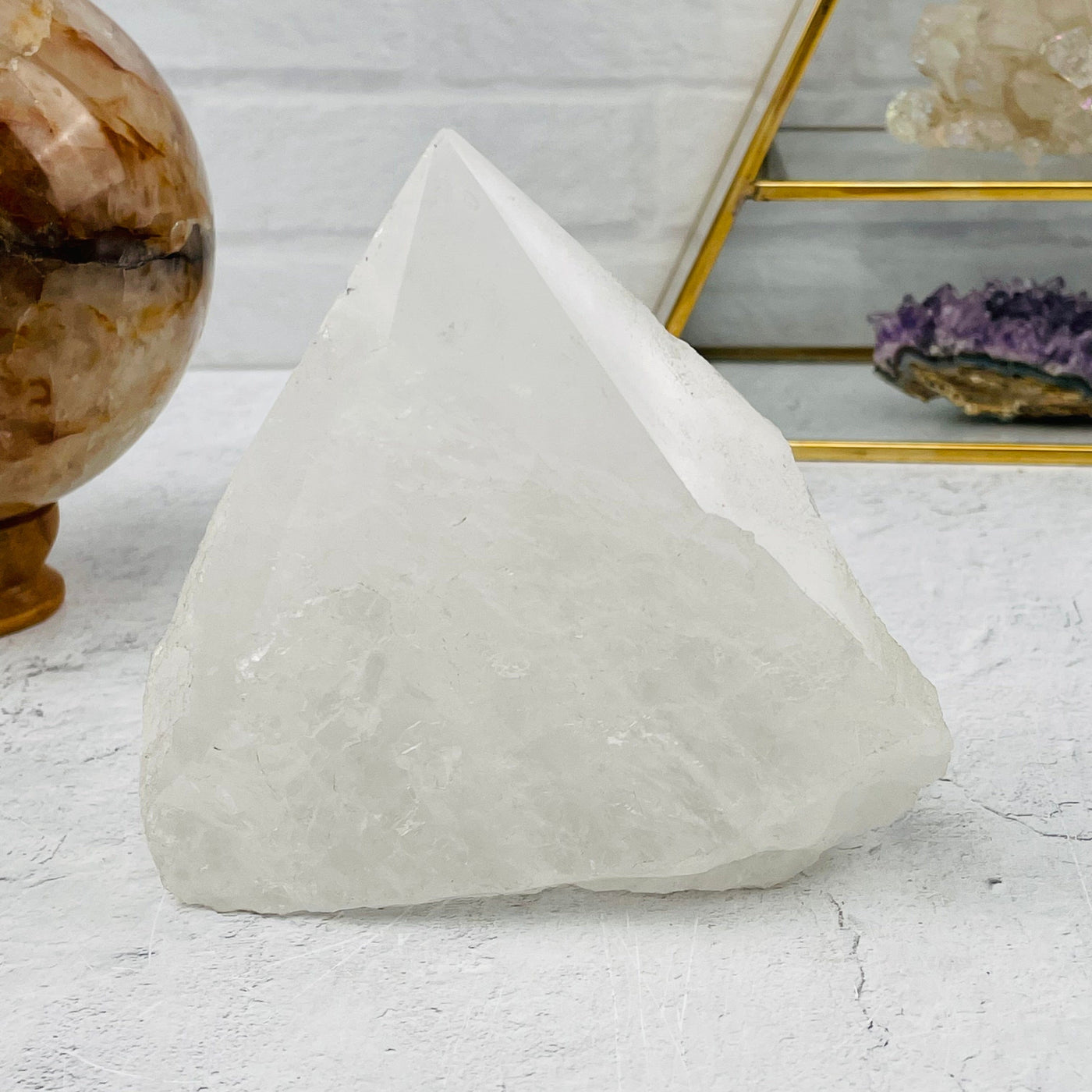 crystal quartz point displayed as home decor 