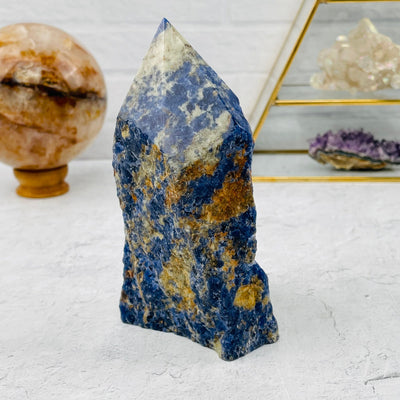 sodalite point displayed as home decor