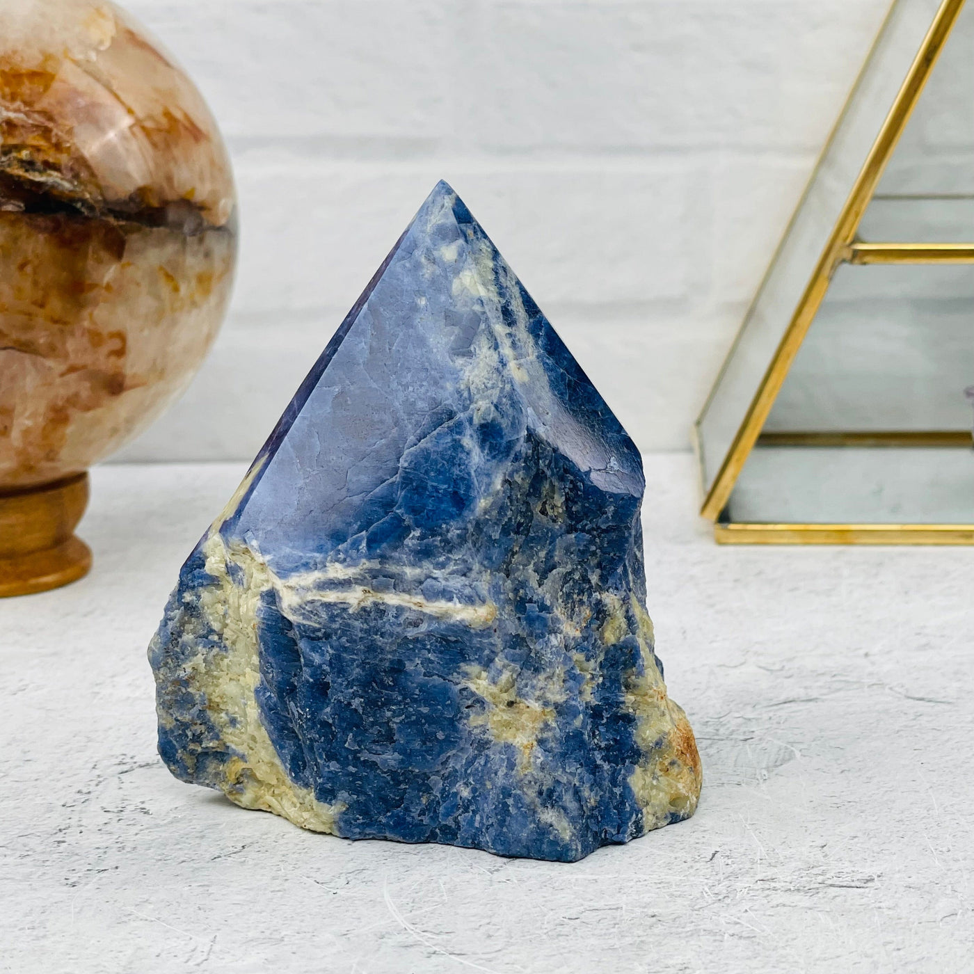 sodalite point displayed as home decor 
