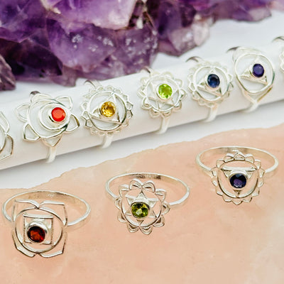 close up of the details on these chakra gemstone rings