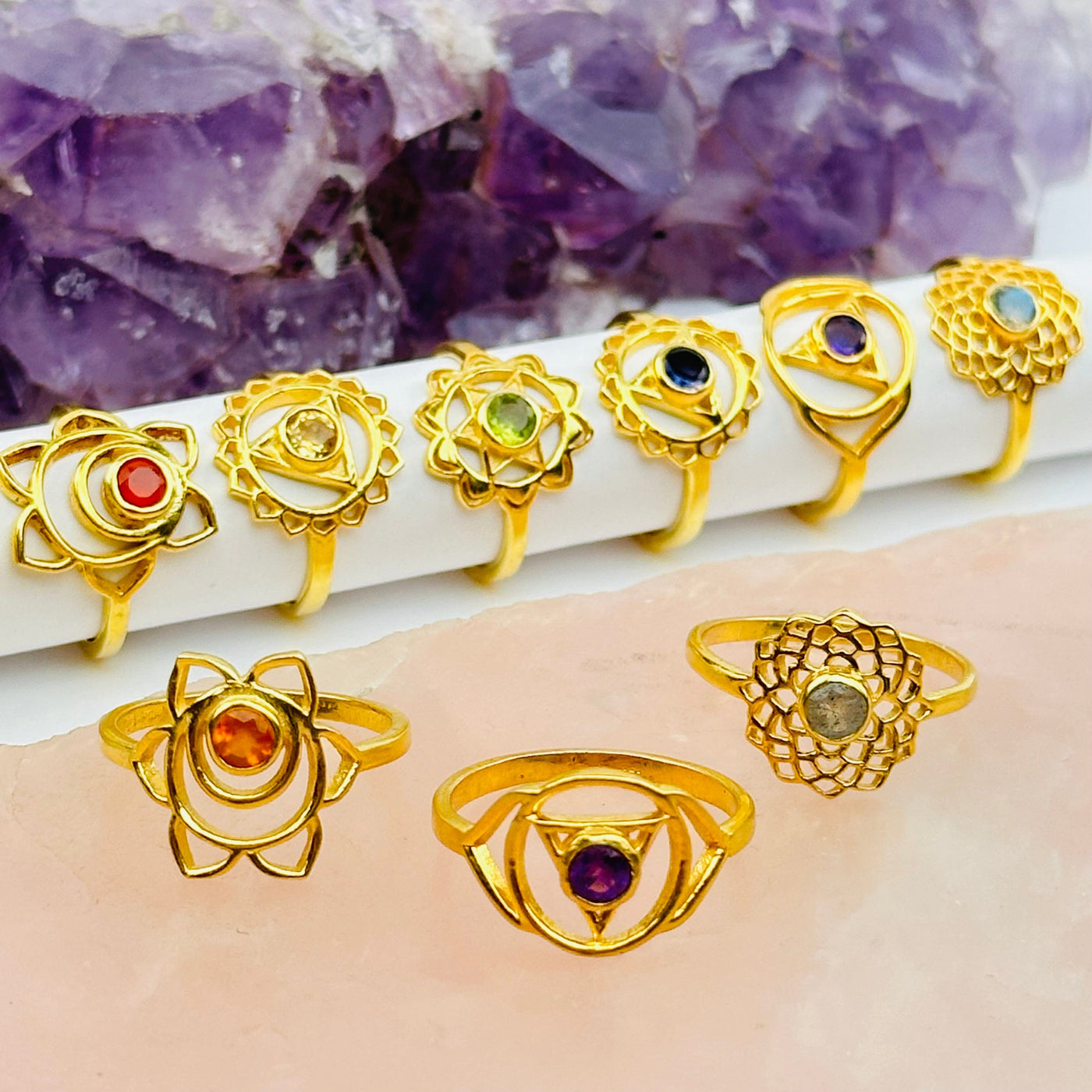 gemstone chakra rings displayed to show the differences in the crystals and chakras 