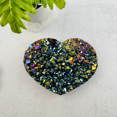 Amethyst Druzy Heart with Rainbow Titanium Finish displayed as home decor 