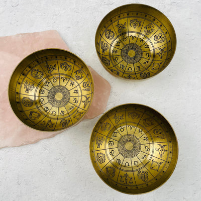 multiple bowls displayed to show the slight differences in the engraved details  