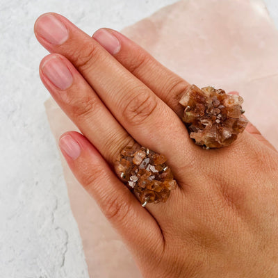 Aragonite Cluster Rings on hand for size reference 