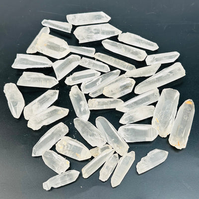 lemurian crystal points are sold by half pound bags