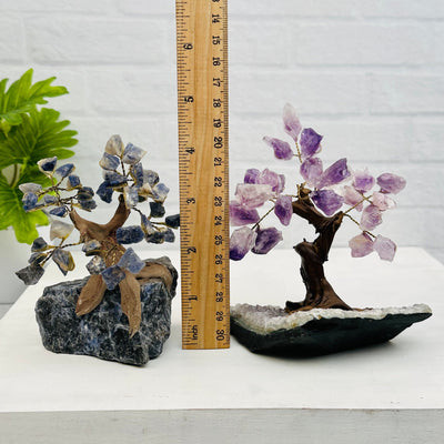 gemstone trees next to a ruler for size reference 