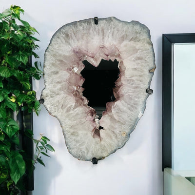 amethyst cluster mirror displayed as home decor