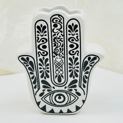 close up of the details on the hamsa hand holder