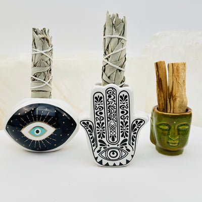 ceramic smudge holders displayed as home decor 