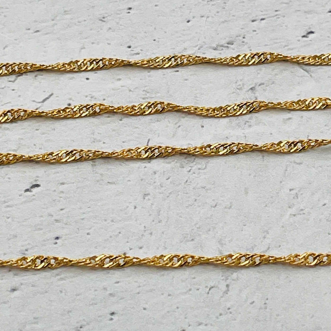 close up of the gold chain 